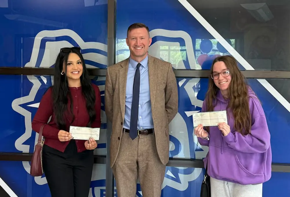 Scott with the Safe Driving Scholarship recipients